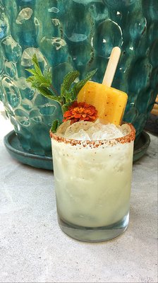 Photo of Cocina de Barrio - San Diego, CA, US. Mango-Tajin Popsicle Margarita