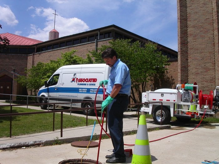 Slide of Associated Plumbing & Sewer Service