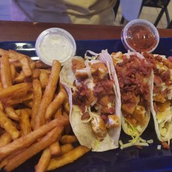 The Beach House Bar & Grille - Chicken club tacos with the best crunchy fries
