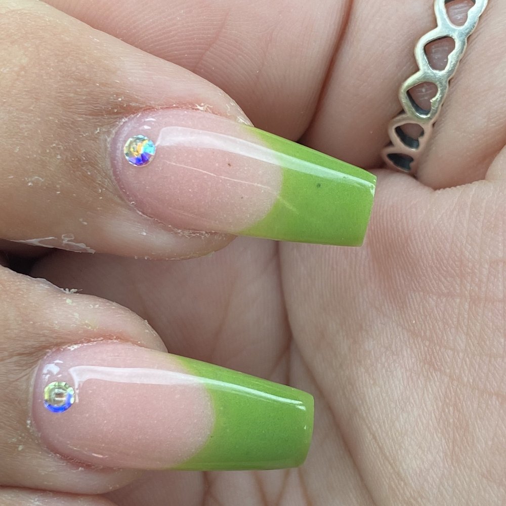 Black specs on index finger.