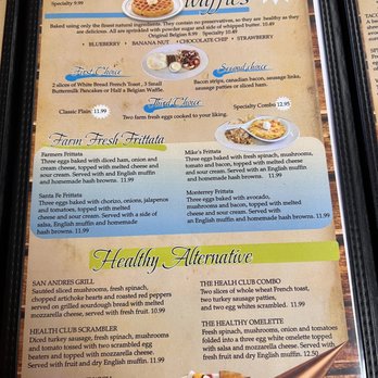 Andres Restaurant - Menu - Page from a restaurant menu showcasing pancake and waffle options, including blueberry, banana nut, chocolate chip, and strawberry flavors. It lists breakfast dishes such as farm fresh frittata, with descriptions of ingredients and prices. The menu emphasizes natural ingredients and includes sections for healthy alternatives and specialty combos. - Spanish Near Me - Batavia, Illinois