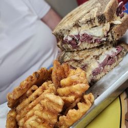 Twisted Tiki Sports Bar & Pizzeria - Reuben and waffle fries