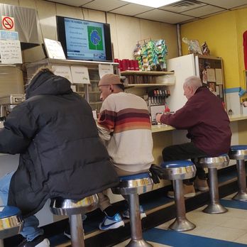 Abe's - "Guests enjoying their dogs while sitting at the counter" - Hot Dogs Near Me - Wilkes Barre, Pennsylvania Abe's - "Guests enjoying their dogs while sitting at the counter" - Hot Dogs Near Me - Wilkes Barre, Pennsylvania