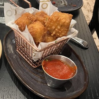 Proof Kitchen and Bar - Jalapeño tots with curry ketchup, dip them in this smothered gravy - Diners Near Me - Manassas, Virginia Proof Kitchen and Bar - Jalapeño tots with curry ketchup, dip them in this smothered gravy - Diners Near Me - Manassas, Virginia