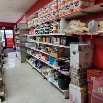 Limeños Deli - a grocery store with shelves filled with food - Latin American Near Me - Copiague, New York