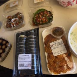 marinated quail eggs, seasoned clams, seasoned fresh perilla leaves, kimchi pancake, spicy pork kimbap