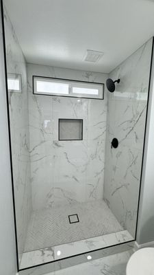 Shower Remodel - Our shower remodel process starts with a personal consultation to understand your vision, needs, and budget, followed by helping you choose the perfect layout, tile, and fixtures. We carefully prepare the site, removing the old shower and protecting your home before inspecting and updating plumbing as needed. Next, we apply professional-grade waterproofing for long-lasting protection, then install your tile with precise craftsmanship for a flawless finish. Once the tile is complete, we add your chosen fixtures, custom touches like niches or benches, and any glass panels or doors. Finally, we seal and polish everything, clean the space, and walk you through your new shower to ensure every detail exceeds your expectations. Shower Remodel - Our shower remodel process starts with a personal consultation to understand your vision, needs, and budget, followed by helping you choose the perfect layout, tile, and fixtures. We carefully prepare the site, removing the old shower and protecting your home before inspecting and updating plumbing as needed. Next, we apply professional-grade waterproofing for long-lasting protection, then install your tile with precise craftsmanship for a flawless finish. Once the tile is complete, we add your chosen fixtures, custom touches like niches or benches, and any glass panels or doors. Finally, we seal and polish everything, clean the space, and walk you through your new shower to ensure every detail exceeds your expectations.