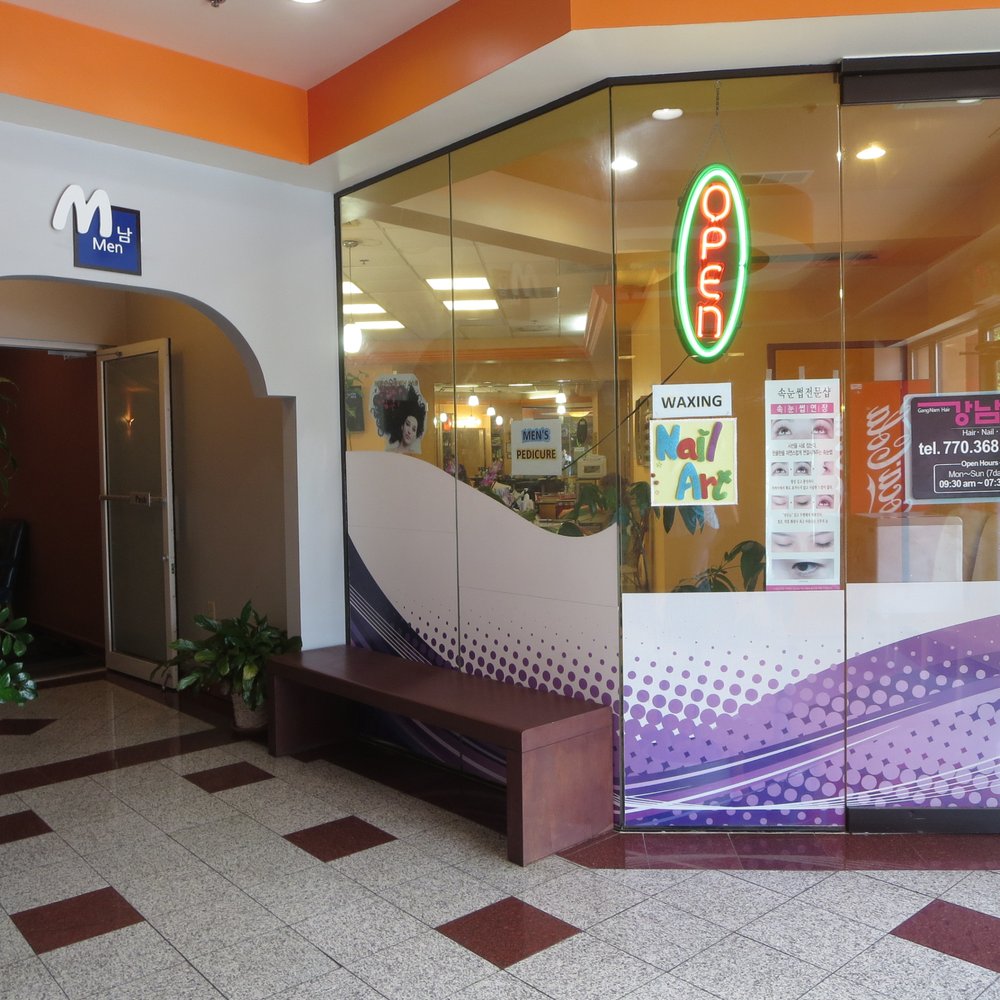 Inside. Entrance to men's area and where the nail salon is located. Inside. Entrance to men's area and where the nail salon is located.