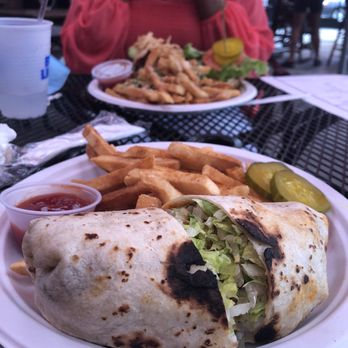 Harlem Tavern - Buffalo Chicken Wrap and Cajun Fries - Pubs Near Me - New York, New York Harlem Tavern - Buffalo Chicken Wrap and Cajun Fries - Pubs Near Me - New York, New York