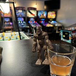 The Garage - Squatch enjoying a delicious Fast Eddys! Nice chill place to have a drink play some old fashioned games