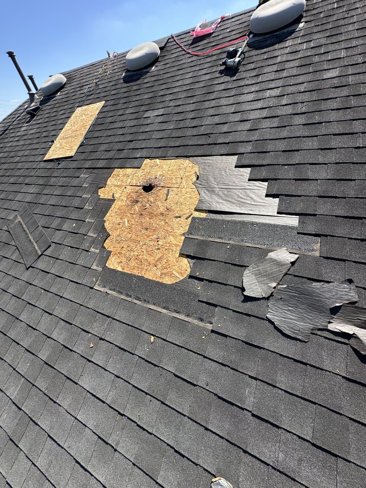 Slide of Redeemer Roofing