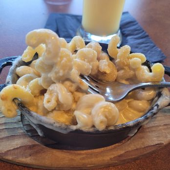 Brick and Bourbon - Mac n cheese (side portion). Next time, I will get the regular entree dish because it was SOOOOO good! Very cool atmosphere! - Cocktail Bars Near Me - Eden Prairie, Minnesota