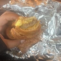 turkey sausage, egg and cheese on a croissant turkey sausage, egg and cheese on a croissant
