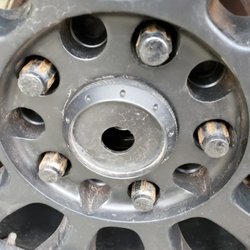 Ferguson Tire Pros - missing caps