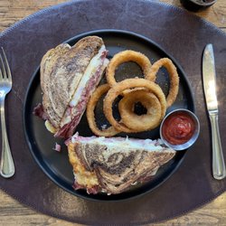 The Ledges - Reuben with onion rings.