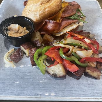 The 5 Spot Cafe - Bacon ham tomato spinach cheddar cheese on a croissant. - American Near Me - Buford, Georgia