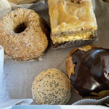 Rose's - Apple mochi cake, apple cream cheese cake, Meyer lemon macaron, and a chocolate dipped cream puff - Desserts Near Me - Durham, North Carolina Rose's - Apple mochi cake, apple cream cheese cake, Meyer lemon macaron, and a chocolate dipped cream puff - Desserts Near Me - Durham, North Carolina