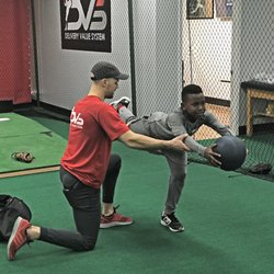 Pitcher executing drill with DVS Instructor