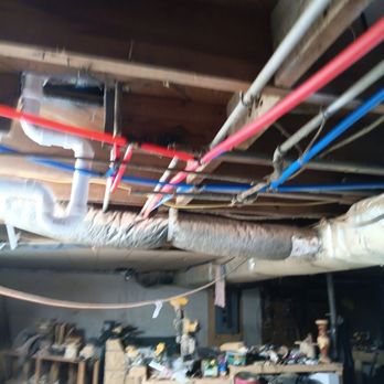 Joe's Plumbing - Joe bypassed the galvanized piping by replacing it with the red and blue hoses, - Water Heater Installation/Repair Near Me Joe's Plumbing - Joe bypassed the galvanized piping by replacing it with the red and blue hoses, - Water Heater Installation/Repair Near Me