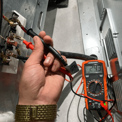 Everest Appliance Repair - Checking the voltage of the outlet power coming to the electric dryer.
