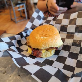 Comeback Burger - a person holding a cell phone - Burgers Near Me - Petersburg, Virginia