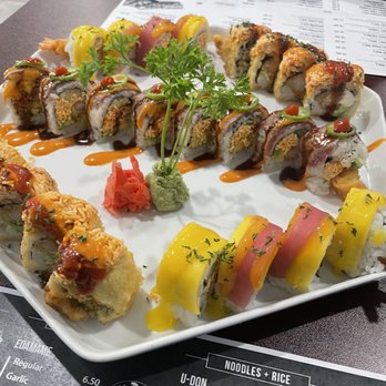 Tokyo 1 - Mango Tango roll, Golden Tiger roll, Texas roll (center) - Sushi Bars Near Me - Midland, Texas