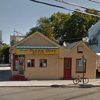 The Original Pizza City - a bicycle parked in front of the building - Pizza Near Me - New Brunswick, New Jersey The Original Pizza City - a bicycle parked in front of the building - Pizza Near Me - New Brunswick, New Jersey
