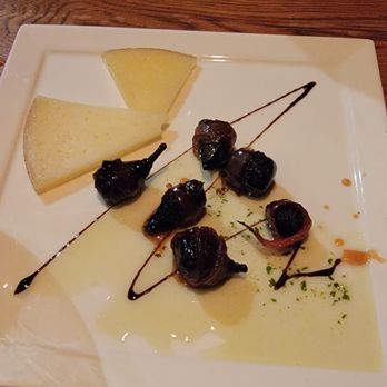 Bistro Roca - Roasted figs wrapped in prosciutto splashed w balsamic and served with Asiago cheese. - Bars Near Me - Blowing Rock, North Carolina Bistro Roca - Roasted figs wrapped in prosciutto splashed w balsamic and served with Asiago cheese. - Bars Near Me - Blowing Rock, North Carolina