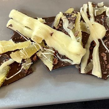 Riverhorse On Main - Complimentary chocolate topped with ginger - New American Near Me - Park City, Utah Riverhorse On Main - Complimentary chocolate topped with ginger - New American Near Me - Park City, Utah