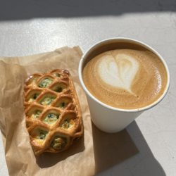 Backyard Brew - Latte w/ honey and oat milk + spinach and feta pie