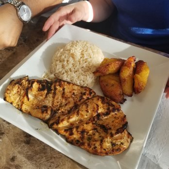 La Fogata - a plate of grilled fish and rice - Latin American Near Me - Miami, Florida La Fogata - a plate of grilled fish and rice - Latin American Near Me - Miami, Florida