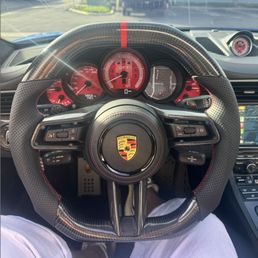 992 Steering Wheel Upgrade on the 991.1 GTS alongside custom dials and gauges on the dash and sport-chrono clock.