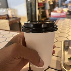 Coffee and breakfast sandwich