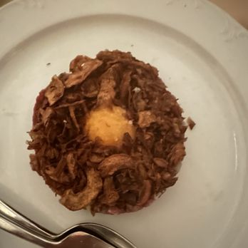 Funke - Filet Mingon tartar under the egg & crispy onions - Italian Near Me - Beverly Hills, California Funke - Filet Mingon tartar under the egg & crispy onions - Italian Near Me - Beverly Hills, California
