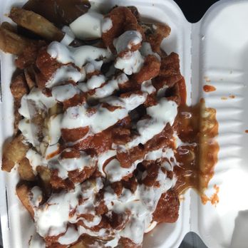 Dudebro Potato - Buffalo chicken poutine! Nice kick with crunchy chicken pieces - Poutineries Near Me - Tobermory, Ontario