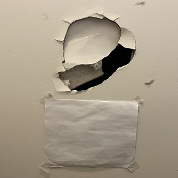 Two Men and a Truck - This is the broken drywall. - Movers Near Me - Burlington, Ontario Two Men and a Truck - This is the broken drywall. - Movers Near Me - Burlington, Ontario