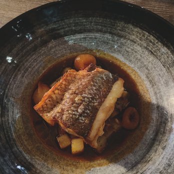 Chapeau - Striped bass. Those are pearl onion to give you sense of how tiny the fish is. - French Near Me - San Francisco, California Chapeau - Striped bass. Those are pearl onion to give you sense of how tiny the fish is. - French Near Me - San Francisco, California