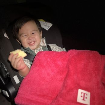 T-Mobile - Happy boy picked up his free T-Mobile hot pink blanket on T-Mobile Tuesday! - Mobile Phones Near Me - Portland, Oregon T-Mobile - Happy boy picked up his free T-Mobile hot pink blanket on T-Mobile Tuesday! - Mobile Phones Near Me - Portland, Oregon