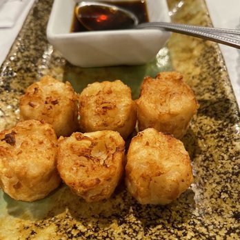 Shuhei - a plate of fried food with dipping sauce - Sushi Bars Near Me - Beachwood, Ohio Shuhei - a plate of fried food with dipping sauce - Sushi Bars Near Me - Beachwood, Ohio