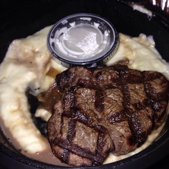 Costa Brava Bistro - Filet with cheese sauce and mashed potatoes (fried onions on the side not pictured). - Spanish Near Me - Bellaire, Texas