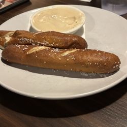 Two of the four soft pretzel sticks