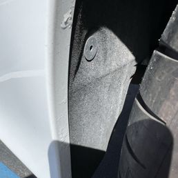 Bubbling/flaking paint and clearcoat on rear bumper. Bubbling/flaking paint and clearcoat on rear bumper.