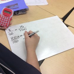 Math Made EZ - Student working at a homework help session.