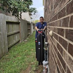 Pure World Water Treatment Systems - One of our top installer doing his thing.