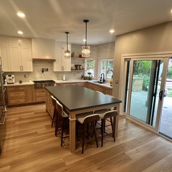 Creative Design & Build - 8' x 4' island; white oak cabinets; soapstone quartz top; dishwasher built-in with custom panel; utility drawer with USB - General Contractors Near Me - San Diego, California Creative Design & Build - 8' x 4' island; white oak cabinets; soapstone quartz top; dishwasher built-in with custom panel; utility drawer with USB - General Contractors Near Me - San Diego, California