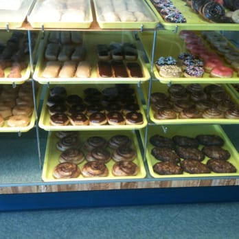 Daylight Donuts - a variety of donuts in a display case - Donuts Near Me - Bixby, Oklahoma Daylight Donuts - a variety of donuts in a display case - Donuts Near Me - Bixby, Oklahoma