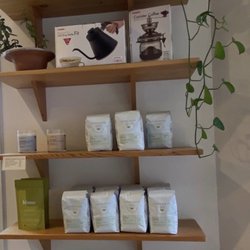 Tofino Coffee Roasting - Wall of coffee