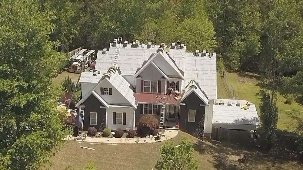 Slide of AMC Roofing & Construction