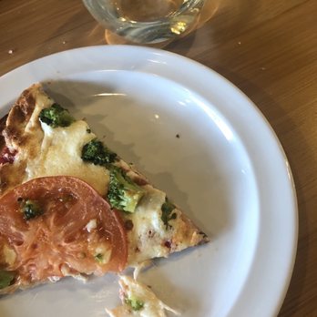 Nexus Pizza - Cauliflower Pizza- With fresh Pizza sauce, broccoli and fresh tomatoes. - Pizza Near Me - Orlando, Florida Nexus Pizza - Cauliflower Pizza- With fresh Pizza sauce, broccoli and fresh tomatoes. - Pizza Near Me - Orlando, Florida