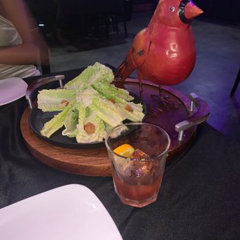 Deluxe Fun Dining - Charcoal Caesar Salad - Bars Near Me - Charlotte, North Carolina Deluxe Fun Dining - Charcoal Caesar Salad - Bars Near Me - Charlotte, North Carolina